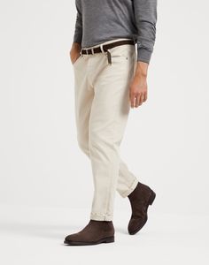 Garment-dyed comfort lightweight denim traditional fit five-pocket trousers The seasonal nuances enrich the iconic style of these garment-dyed denim five-pocket pants, characterized by a lightweight and comfortable texture. The traditional fit expresses the classic Brunello Cucinelli style and features regular lines along the leg. Classic Chinos With Straight Hem And Five Pockets, Business Casual Chino Cotton Twill Jeans With Welt Pockets, Business Casual Trousers Jeans With Five Pockets, Classic Straight Chinos With Five Pockets, Classic Beige Straight Leg Jeans, Chino Cotton Twill Bottoms With Five Pockets, Straight Leg, Classic Trousers Jeans With Five Pockets, Classic Beige Pants With Five Pockets, Classic Straight Leg Bottoms For Casual Gatherings