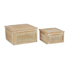 two wicker boxes sitting next to each other