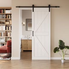 an open door leading to a living room with bookshelves