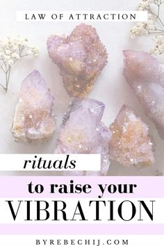 the words rituals to raise your vibration on top of crystals and flowers