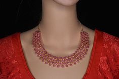 Beautiful ruby necklace with pressing style earrings. South traditional necklace . Suitable for pattu sarees Pink Temple Jewelry For Puja, Pink Temple Jewelry Necklace For Festive Occasions, Pink Temple Jewelry Necklace For Festivals, Pink Temple Necklace For Festive Occasions, Festive Pink Temple Necklace, Pink Temple Necklace For Diwali, Pink Temple Necklace For Festivals, Pink Jewelry For Diwali Puja, Pink Jewelry For Puja Festivals