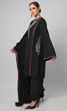 Embroidered black salwar phiran set. It is a detailed and intricate form of contrast piping and zari work embroidered on sleeves, pockets and neck, colorful stitches to create patterns and designs on the fabric of the garment. It is a popular choice for special occasions, such as weddings and festivals. Salwar suits are more modern and casual alternative to the traditional salwar kameez Fabric Details TOP Pure polyster poplin with zari work detailing on neck and sleeves, Full loose sleeves Dupat Black Dupatta With Resham Embroidery In Traditional Drape, Black Dupatta With Resham Embroidery, Black Traditional Dupatta For Designer Wear, Black Traditional Designer Dupatta, Designer Black Churidar With Embroidered Border, Kashmiri Suits Salwar Kameez, Black Embroidered Dupatta In Traditional Drape, Embroidered Black Dupatta In Traditional Drape, Elegant Unstitched Suit With Embroidered Border And Long Sleeves