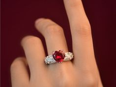 Behold the epitome of love and elegance with our exquisite Heart Cut Ruby Ring, crafted delicately in sterling silver, a symbol of everlasting commitment and passion.  This stunning piece features a vibrant 10*10 MM Ruby gemstone, weighing 4.5 CT, nestled gracefully within a sterling silver setting.  Perfect for any occasion, whether it's a promise of forever, an engagement to cherish, or a celebration of enduring love, this ring transcends time and tradition.  Each ring is meticulously crafted Heart Cut Ring, Ring Heart, Zierlicher Ring, Ring Birthstone, First Anniversary, Ring Dainty, Ring Promise, Ruby Gemstone, Ruby Ring