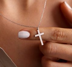 Experience the timeless beauty of our Cross Silver pendant necklace. Crafted with sterling silver, this 18 inch necklace boasts a stunning cross pendant that adds a touch of elegance to any outfit. A perfect addition to your jewelry collection! White Cross Pendant Necklace With Clavicle Chain, White Cross Necklace With Clavicle Chain, Sterling Silver Clavicle Chain Crucifix Jewelry, Sterling Silver Crucifix Clavicle Chain, Silver Cross Necklace With Clavicle Chain, Minimalist Sterling Silver Cross Necklace With Clavicle Chain, Sterling Silver Clavicle Chain Cross Necklace, Sterling Silver Cross Necklace With Clavicle Chain, White Cross Necklace With Medium-length Chain