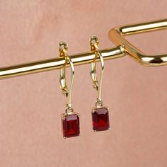 It is a stone that represents passion, true friendship,success and consistency. Our 14K solid gold and rectangular cut dangling garnet earring is suitable for daily use with its special design and is a stylish jewelery that you can use on your special days and gift it to your loved ones. A stylish jewel for you and your loved ones. Time to pamper yourself and your loved ones... Garnet is the birthstone for those born in January. 🤍🤍 Special gifts for your special moments. We produce our jeweler Gold Rectangular Gemstone Earrings, Elegant Oblong Jewelry With Ear Wire, Rectangular Yellow Gold Earrings With Gemstone, Elegant Rectangular Jewelry For Anniversary, Elegant Earrings With Rectangular Stone For Anniversary, Square Cut Jewelry With Matching Earrings For Gift, Oblong Jewelry With Matching Earrings For Gifts, Oblong Jewelry Set With Matching Earrings As Gift, Elegant Oblong Gemstone Jewelry