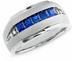 a men's ring with blue sapphires and diamonds in white gold plated