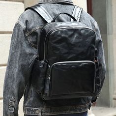 Whether you're on your way to the office, participating in business meetings, or setting off for a weekend getaway, this leather backpack serves as the ideal companion for the modern man on the move. Its versatile design seamlessly transitions between professional settings and casual outings, ensuring that you make a stylish statement wherever you go. The leather construction not only adds a touch of sophistication but also guarantees durability for your on-the-go lifestyle. Equipped with ample storage space, it accommodates your work essentials during weekdays and seamlessly transitions to a reliable travel companion for your weekend escapades. The thoughtfully crafted details and modern aesthetic make it a go-to accessory, effortlessly blending functionality with a refined sense of style Large Capacity Leather Business Backpack, Black Leather Backpack For Business Trips, Leather Backpack For Travel, Functional Leather Backpack For Business, Business Backpack In Soft Leather, Leather Laptop Bag With Large Capacity, Classic Black Leather Backpack For Business Trips, Modern Black Backpack For Business Trips, Leather Backpack For Commuting