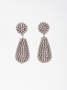 Expertly crafted, the Mila Drop Rhinestone Earrings add a touch of elegance to any outfit. With a delicate drop design and sparkling rhinestones, these earrings are perfect for any occasion. Their timeless beauty and subtle shine make them the perfect accessory for any fashion-forward individual. SizeH: 2.15"W: 0.75" QualityMade with quality materials for endurance. ImportedEY12699 Sterling Silver Crystal Earrings With Rhinestones For Evening, Crystal Beaded Drop Earrings For Party, Elegant Metal Teardrop Earrings For Parties, Elegant Drop Beaded Earrings For Party, Elegant Silver Teardrop Earrings For Party, Silver Bling Crystal Drop Earrings, Silver Bling Drop Earrings, Silver Crystal Beaded Earrings For Party, Silver Bling Earrings For Evening