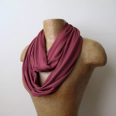 This infinity scarf comes in a sweet shade of marsala. The lightweight jersey blend is super soft with a fair amount of stretch. Sewn with a double layer, it has no open seams or raw edges. Length - approximately 65" round Width - approximately 14" Color - marsala Material - jersey Care - Wash on delicate using a lingerie bag, lay flat to dry. Scarf Handmade, Loop Scarf, Raw Edge, Infinity Scarf, Lay Flat, Double Layer, Lingerie, Color