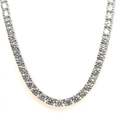 Stunning Modern 18k White Gold Natural 11.29 Carat Round Brilliant Diamond Tennis Necklace, approximately 2.7mm diameter, G-H in color and VS-SI1 in clarity.  The piece is set with 140 diamonds and is 16.5" inches in length and weighs 20 grams. Classic White Gold Tennis Necklace With Lab Grown Diamonds, Classic White Gold Tennis Necklace With Lab-grown Diamonds, Fine Jewelry Tennis Necklace With Brilliant Cut Cubic Zirconia, Fine Jewelry Cubic Zirconia Tennis Necklace With Brilliant Cut, Dazzling Diamond White Round Cut Tennis Necklace, Round Cut Moissanite Tennis Necklace In White Gold, Silver Tennis Necklace With Round Diamond Cut, Classic Diamond Tennis Necklace As Gift, Silver Tennis Necklace With Diamond Cut