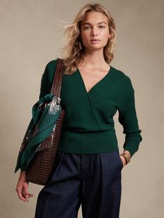 Subtle drama, this beautiful wrap-front sweater employs a blouson sleeve and ribbed texture along the cuff and hems to create gentle contrast to the more fitted bodice.  Crafted from a soft and smooth blend of LENZING™ ECOVERO™.  SEMI-FITTED: Cut Spring Office Wear, Forest Emerald Green, Wrap Front Sweater, Classy Winter Outfits, Olive Green Sweater, Cable Knit Turtleneck Sweater, Blouson Sleeve, Winter Capsule Wardrobe, Cozy Knit Sweater