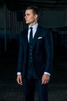 Color: Navy Dapper Fitted Suit For Business Casual, Dapper Fitted Business Casual Suits, Wool Suit And Tie Accessories For Business Casual, Wool Three-piece Suit Single Breasted For Business Casual, Wool Three-piece Single Breasted Suit For Business Casual, Luxury Fitted Sport Coat In Suiting Fabric, Tailored Double Breasted Suit For Work, Tailored Dapper Double Breasted Suit For Workwear, Bespoke Double Breasted Suit