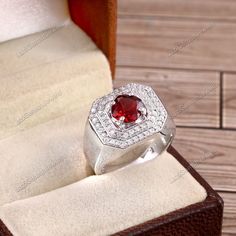 "This Ring features a beautiful Natural Garnet gemstone set in a customized sterling Silver A lovely Ring to your jewelry collection ! Item Description ! => Gemstone Type - Garnet => Gemstone Size - 7 mm => Gemstone Cut - Faceted Round => Metal Type (Main Photo) - 925 Sterling Silver =>Gemstone Quality: AAA+ =>Secondary Stone - cubic Zircon(Small White Stone) ? Shipping information : ? Tracking number ? ? Expedited / Express shipping - check our \"shipping upgrades\" when you checkout Feedback: Luxury Handmade Ruby Ring For Men, Luxury Gemstones With Halo Setting For Gift, Round Diamond Gemstone Gift, Diamond Birthstone Signet Ring For Anniversary, Ruby Ring With Diamond, Round Shape, Gift, Round Diamond Ruby Ring Gift, Round Ruby Ring With Diamond For Gift, Diamond Ruby Ring With Center Stone As Gift, Diamond White Sapphire Ring With Center Stone For Gift