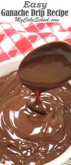 melted chocolate in a white bowl with a wooden spoon on top and checkered tablecloth