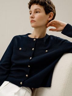 For the new collection, LILYSILK has come up with a nautical-style wardrobe, mixing and matching the classics and adding extra sexy details. This cardigan from LILYSILK's SS24 collection is woven from soft wool in a classic navy blue and is a bold fusion of the sophistication of the little office jacket and the assertive style of a short coat. It features a round collar, two patch pockets, and gold-toned buttons embellished with the LILYSILK crest. Combining comfort and elegance, it creates a stylish, structured silhouette. Ideal for daytime or office wear, mix and match it with a jumper and skirt. Nautical Inspired Outfit, Jumper And Skirt, Office Jacket, Lady Jacket, Womens Active Wear Outfits, Silk Pajamas Women, Fair Isles, Camisole Set, Striped Midi Skirt