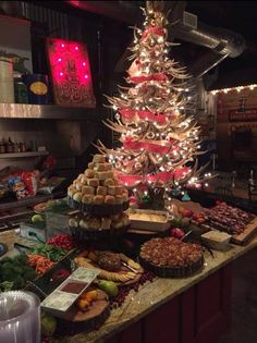 a christmas tree made out of pies and other food