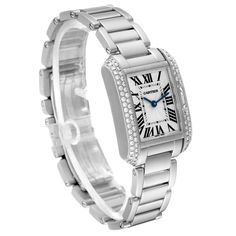 Cartier Tank Anglaise White Gold Diamond Ladies Watch WT100008. Quartz movement. 18k white gold case 30.2 x 22.7 mm. Circular grained crown set with an original Cartier factory diamond. 18k white gold original Cartier factory diamond bezel. Scratch resistant sapphire crystal. Flinque and silvered dial with black Roman numerals. Sword shaped blued steel hands. Secret Cartier signature at X. 18k white gold bracelet with hidden butterfly clasp. Fits 6" wrist. Cartier Diamond Watch With Round Dial, Cartier Diamond Watch With Diamond Accents, Classic Platinum Diamond Watch With Brilliant Cut, Luxury Cartier Diamond Watch With Diamond Accents, Luxury Cartier Diamond Watch For Anniversary, Classic Diamond White Watch With Brilliant Cut, Classic Wedding Jewelry And Watches With Diamond Hour Markers, Cartier Diamond Watch With Brilliant Cut, Cartier Diamond Watch With Polished Finish For Formal Occasions