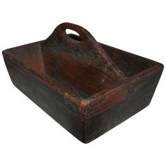 an old rusty metal container with handles