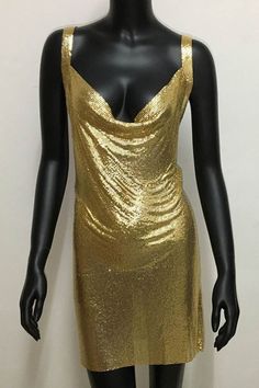 As a product expert, I present to you the stunning Halter Silver Gold Sequined Homecoming Dresses. These dresses feature a halter neckline and are adorned with silver and gold sequins, making them perfect for any special occasion. The sequins add a touch of glamour and will surely make the wearer stand out in a crowd. Elevate your wardrobe with these beautiful and sophisticated dresses. Details: Dress Style: A-Line Color: Silver, Gold Neckline: V-Neck Sleeves: Sleeveless Back Style: Zipper Glamorous Gold Mini Evening Dress, Gold Party Mini Dress With Contrast Sequin, Gold Mini Dress For Evening, Glamorous Style, Gold Embellished Sleeveless Mini Dress, Gold Mini Dress With Contrast Sequin For Party, Glamorous Gold Mini Dress With Contrast Sequin, Gold Embellished Sleeveless Sequin Dress, Gold Contrast Sequin Mini Dress For Evening, Gold Mini Dress With Contrast Sequin For Evening