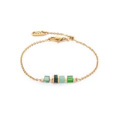 Enjoy the simple elegance of our Mini Cubes & Chain bracelet in gold-green - a sophisticated piece of jewellery that enchants with its delicate design and the unique charm of the materials. This piece of jewellery combines the timeless beauty of real stone cubes such as green aventurine with the dazzling brilliance of Swarovski crystals. The innovative sliding clasp ensures a customised fit and allows you to adjust the length of the bracelet to your liking, ensuring optimum wearing comfort. Dainty Green Gold Plated Bracelets, Green Formal Jewelry Chain, Formal Green Chain Jewelry, Elegant Green Metal Charm Bracelet, Luxury Green Chain Jewelry, Green Gold-plated Bracelet For May Birthstone, Green Minimalist Metal Jewelry, Minimalist Green Metal Jewelry, Adjustable Dainty Green Chain Bracelet