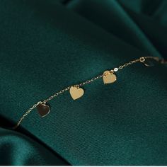 14K MULTIPLE HEART BRACELET - GOLD HEART BRACELET FOR WOMEN ❤️ ITEM DETAILS Material:14K Solid GOLD (Not filled or plated). Gold Bracelet Chain Length: 17cm Main Chain + 2cm Adjustable Chain Part Chain Width: 0,65mm Finish: 14K Yellow Gold Stone: Zİrcon ♥ SHIPPING We work with Dhl Express for worldwide shipping. Please leave your phone number at checkout for delivery purposes. Production time: 3-5 business days. ❤️ You May Also browse other Gold Bracelets Here: http://etsy.me/3qPFgMw ➤ ❤️ To bro Luxury Heart Charm Bracelet Gift, Heart-shaped Yellow Gold Bracelets For Formal Occasions, Heart-shaped Yellow Gold Formal Bracelets, Formal Heart-shaped Yellow Gold Bracelets, Formal Yellow Gold Heart Bracelets, Luxury Heart Charm Bracelet For Anniversary, Luxury Heart Cut Bracelet As Gift, Luxury Heart Cut Bracelet For Gift, Luxury Heart-cut Bracelet For Gift