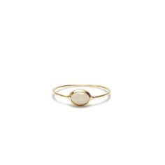 Classic Oval Opal Ring With Bezel Setting, Classic Oval Bezel Set Opal Ring, Everyday 14k Yellow Gold Opal Ring, Timeless Oval Stackable Rings With Bezel Setting, Timeless Stackable Rings With Bezel Setting, 14k Gold Oval Cabochon Moonstone Ring, Minimalist 14k Gold Oval Cabochon Jewelry, Minimalist 14k Gold Oval Opal Ring, Minimalist Oval Cabochon Opal Ring