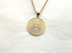 women's and men's circle eye of providence necklace pendant 1 25.5mm made in 14k or 18k solid goldthis is large version of 14k, 18k eye of providence necklace 1 that the diameter is 25.5mm.eye of providence that also known as all-seeing eye of God is a symbol that depicts an eye.each side of it has different design with exquisite details.model wears a 2.1mm 50cm chain.free shipping on all orders!14k gold eye of providence necklace weightpendant only 8.38g (±7%)with a 2.1mm 42cm chain 14.13g (±7% 14k Gold Jewelry With Coin Pendant, 14k Gold Coin Pendant Jewelry, Spiritual 14k Gold Medallion Jewelry, Classic 14k Gold Jewelry With Coin Pendant, Symbolic 14k Gold Coin Pendant Jewelry, Symbolic 14k Gold Star Of David Jewelry, Classic 14k Gold Coin Pendant Jewelry, Symbolic Tarnish Resistant Round Pendant Jewelry, Durable Symbolic Round Pendant Jewelry