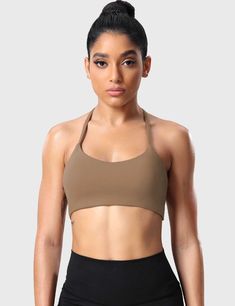 Featuring a backless design, removable cups, and a cool lining, this sports bra is perfect for the studio or light training. This top comes with a support brace and adjustable straps to suit your preferences. The soft crew neckline adds a touch of femininity to the overall design. The material is made from our super comfortable and stretchy skin-friendly fabric that is soft to the touch and incredibly smooth to the touch, and the mesh lining is designed to be moisture-wicking and breathable, ma Yoga Crop Tops, Klein Blue, Neck Strap, Black Rose, Moisture Wicking, Suits You, Grey And White, Sports Bra, Overalls