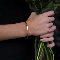 A beautiful solid 9ct gold bangle, textured with the signature Storybook finish both inside and out.The Storybook texture reflects the tactile quality of leather bound books from Alison's childhood and it is finished with a gorgeous flowing edge reminiscent of well thumbed pages of those books.The gold bangle gently flows around your wrist and its natural feel and simple style make the bangle the perfect piece of jewellery.. A lovely, unique design which will be cherished for years to come.Each Modern Hammered Yellow Gold Bracelets, Elegant 14k Gold Hammered Bracelet, Anniversary Hammered Yellow Gold Bracelets, Luxury Hammered Bracelets Gift, Luxury Hammered Bracelets As Gift, Luxury Hammered Bracelets For Gift, Elegant Hammered Yellow Gold Bracelet, Hammered 14k Gold Bracelet For Gift, 14k Gold Hammered Bracelet Gift