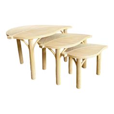 three tables made out of wood with curved legs