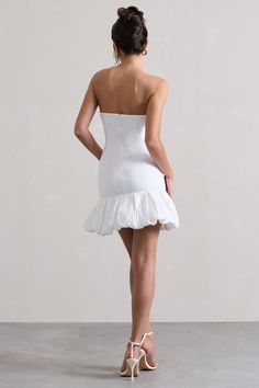 Liscia is the perfect bouncy mini for a summer day out with the girls, whether its drinks in the city or a picnic on the beach. This dress arrives in our premium white stretch crepe and taffeta, featuring a figure enhancing bodice and dreamy ruffled hemline. Throw your hair up into an effortless tousled bun to further enhance your frame in Liscia. Features - Premium stretch crepe and taffeta- Bandeau neckline- Strapless- Invisible zip closure - Ruffled hemline - Mini length Sizing & Fit Model is 5'7 and wears UK size 8 / US size 4 Product Information Designed exclusively by Club L London Fully lined with good stretch Premium stretch crepe and taffeta in White (86% Polyamide, 14% Elastane) 84cm total length SKU: CL134755005 Picnic On The Beach, Bandeau Mini Dress, White Bandeau, Black Dress Prom, Black Tie Gala, Party Dress Long Sleeve, Maxi Dress Prom, Christmas Party Dress, Bridesmaid Outfit