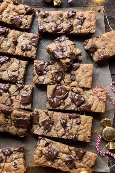 chocolate chip cookie bars with candy canes on the side