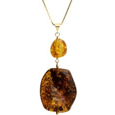 Due to inherent nature of natural stones, there may be slight variation in stone sizes, shapes, colors and patterns Raw Baltic Amber Stone on Vermeil Necklace The large Cognac stone comes in 2 sizes: extra large bottom stone approx. 1 1/4" long x 1" wide and 3/4' thick and smaller flatter stone approx. 1 1/8" long and 1" wide and 1/2" thick. Pick the one you want in drop down bar.Italian 18kt Vermeil Box Link Chain. Adjustable Length Approx. 16" - 18"Due to inherent nature of natural stones, the Oval Amber Necklaces With Natural Stones, Luxury Baltic Amber Necklaces In Amber Color, Amber Natural Stones Long Necklace, Luxury Baltic Amber Necklaces, Baltic Amber Gemstone Necklaces, Drop Down Bar, Amber Necklace, Amber Stone, Stone Pattern