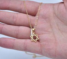 Jewish star necklace made of 21K gold-filled Judaica jewelry Handmade Jewish spiritual necklace. Spiritual Jewish gift Handmade Star of David jewelry Gift for Dad Gift for Mom Gift for Woman Gift for Man A gift for Hanukkah A gift for Valentine's Day Cheap Star Of David Necklace For Gift, Spiritual Gold Jewelry With Star Charm, Star Of David Necklace For Gift, Gold Star Of David Charm Necklace As Gift, Gold Plated Star Of David Necklace As Gift, Gold Star Of David Charm Necklace For Gift, Spiritual Star Of David Charm Necklace Gift, Yellow Gold Star Of David Charm Necklace Gift, Gold Star Of David Jewelry Gift