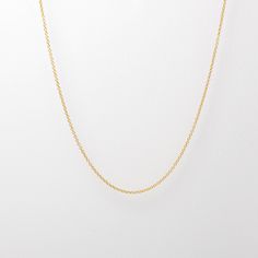 This classic chain exudes a vintage, simple feel, that will never be out of style. Charm Compatible. Simple Charm Necklace With Round Pendant And Delicate Chain, Dainty Everyday Necklace With Chain, Classic Charm Necklaces With Delicate Chain For Gift, Classic Charm Necklaces With Link Chain, Classic Necklace With Delicate Chain Links, Timeless Charm Necklace With Adjustable Chain For Everyday, Classic Oval Link Necklace For Everyday, Classic Long Chain Necklace With Adjustable Chain, Everyday Charm Necklaces With Cable Chain