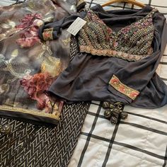 Hi Ladies I’m Selling A Beautiful Indian 4 Piece Outfit. I Will Consider All Offers, Tags Attached Still. And Everything Comes From A Pet-Free And Smoke-Free Home Measurements Of Blouse: 36” Busy With 2 Inches Of Margin Inside For Alterations. Also, The Pads Can Be Removed And Sleeves Can Be Added. Skirt/Lengha Has A Zipper Opening On The Side And Waist Is 34 Inches Circumference And It Is 42 Inches Long. Multicolor Formal Sets For Festivals, Designer Silk Dupatta For Party, Designer Traditional Wear With Dupatta For Party, Designer Party Dupatta For Festive Occasions, Elegant Party Dupatta With Motifs, Designer Blouse Piece With Dupatta For Party, Designer Dupatta For Party Festivals, Designer Saree For Party And Festivals, Black Sets With Motifs For Festive Occasions