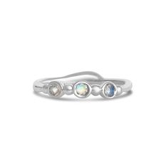 Wear them on their own or stacked all the way up your finger, our gemstone stacking bands in reclaimed sterling silver are the perfect addition to your daily jewels, a perfect gift for a loved one or yourself. Available in Ruby, Rhodolite Garnet, London Blue Topaz, Peridot, Amethyst, Blue Zircon, Spessartite Garnet, and Moonstone or mixed (pick your own, message us for your selection) Each Stone measures approx 2.5mm. These beautiful pieces are handmade to order in Emily's Hudson Valley studio. Elegant Stackable Moonstone Ring In Sterling Silver, Elegant Stackable Sterling Silver Moonstone Ring, Silver Stackable Rings With Round Gemstones, Silver Stackable Rings With Gemstone, Celestial Moonstone Stackable Rings, Spiritual Gemstone Stackable Promise Rings, Adjustable Silver Stackable Jewelry, Sterling Silver Three Stone Round Gemstones, Round Sterling Silver Three-stone Gemstones