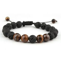 RSAMD Handmade Lava Rock Stone Essential Oil Diffuser Braided Rope Yoga Beads Bracelet-Tiger Eye Welcome to our jewelry emporium that's brimming with dazzling options for every style seeker. For the lovely ladies, we have an array of enchanting pieces. From the dainty necklaces that delicately adorn your collarbone to the elaborate rings that make a bold statement. There are bracelets that add a touch of grace and earrings that enhance your beauty. But don't think we've forgotten about the gentl Elaborate Rings, Spiritual Lava Stone Stretch Bracelet With Natural Stones, Lava Stone Beaded Bracelet Jewelry, Meditation Bracelets With Natural Lava Stones, Mens Lava Bead Bracelet, Yoga Bracelet Beads, Casual Hand-strung Lava Stone Beaded Bracelets, Hope Diamond, Yoga Beads