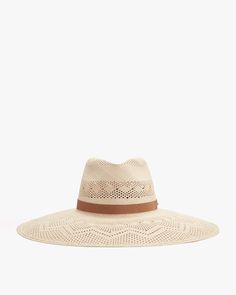 Wide-brimmed hat with perforated pattern and a ribbon band. Adjustable Flat Brim Sun Hat With Open Weave, Adjustable Open Weave Sun Hat In Toquilla Straw, Natural Woven Fedora, Beige Woven Straw Hat Bands, Beige Bohemian Panama Hat For Warm Weather, Adjustable Short Brim Sun Hat With Open Weave, Bohemian Beige Panama Hat For Warm Weather, Adjustable Sun Hat With Open Weave And Short Brim, Spring Straw Hat With Open Weave And Flat Brim