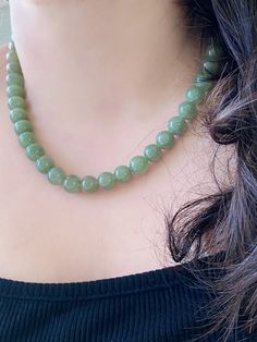 Wrap yourself in the healing embrace of our Lake Green Jade Bead Necklace. Each 9mm bead radiates with the stone's reputed abilities to foster healing, promote emotional well-being, and encourage a sense of inner peace. Revered for its connection to growth and vitality, this enchanting necklace is designed to be not only a testament to elegance but also a source of balance and rejuvenation in your life. Let this timeless piece of jade be your daily companion, enhancing tranquility and attracting Jade Bead Necklace, Jade Beads, Green Jade, Emotional Wellness, Jade Green, Inner Peace, Bead Necklace, Timeless Pieces, High Grade