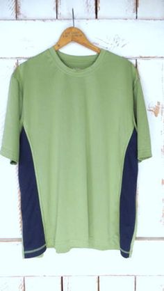 "Vintage 90s light green/dark blue athletic performance short sleeve pullover shirt/sports/gym/work out fitted pullover tshirt tee/large Features... -lightweight performance style polyester -Jockey Measurements...taken flat -marked size: large -pit to pit: 22\" (55.8 cm) -length: 27\" (68.6 cm) Condition... -excellent vintage condition -minor wear QA1851" Athletic Fit Crew Neck T-shirt For Athleisure, Casual Short Sleeve Activewear For Light Sports, Crew Neck T-shirt For Light Sports, Sportswear Crew Neck T-shirt For Workout, Athleisure Crew Neck Sports T-shirt, Casual Crew Neck T-shirt For Training, Athleisure Crew Neck T-shirt For Sports, Relaxed Fit Short Sleeve T-shirt For Light Sports, Functional Stretch Cotton T-shirt