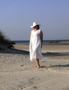 Handmade 100% soft linen loose ruffled sleeveless dress with belt and pockets. Made with love for You. *100% local medium weight washed soft linen *Washed linen *Suitable for pregnancy *Each item is individually cut and sewn by order *The hem of the dress is asymmetrical - the dress is longer on the sides *The model height is 172 cm *The model is wearing size L (oversize dress), dress color - White *Note that colors may look different on your display depending on their settings and technical cha Sleeveless Linen Maxi Dress With Ruffles, Summer Vacation Linen Dress With Ruffles, White Linen Ruffle Dress For Beach, Summer Sleeveless Linen Dress With Ruffles, White Linen Ruffled Beach Dress, White Linen Ruffled Dress For Beach, Summer Linen Beach Dress With Ruffles, White Linen Beach Dress With Ruffles, Sleeveless Ruffled Linen Dress For Daywear