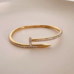 Brand New Brilliant High Quality Vibrant Stainless Steel Nail Bracelet. With Vibrant Zirconia Stones All Around You Will Love It! Size 18-19cm Tarnish Free, Hypoallergenic Available In Gold, Silver And Rose Gold Color, And Also The Nail Ring, Please Check My Store! Thank You Price For One And Fast Shipping Nail Bangle, Nail Bracelet, Gold Nail, Steel Nail, Nail Ring, Gold Nails, Rose Gold Color, Cz Stone, Christmas List