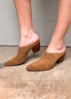 Hop on the TREND TRAIN with these super cute Pointed Toe Suede Mules. The color is chef's kiss for fall. Comfortable enough for all day wear, these new mules from Matisse will become your go to this season. The heel is not too high and the style is perfect. If you live in the south, this will be a good shoe for most of the winter. Suede upper Manmade outsole 2.5 in/6.35 cm heel Textile lining Padded insole Leather stacked heel Imported Brown Pointed Toe Mules With 4-inch Heel, Brown Pointed Toe Mules With Contrasting Heel, Brown Pointed Toe Mules With Contrasting Heel Counter, Brown Closed Toe Mules With Sculpted Heel, Trendy Brown Slip-on Mules, Brown Block Heel Mules With Branded Heel Counter, Chic Brown Pointed Toe Mules, Brown Almond Toe Mules With Sculpted Heel, Spring Clogs With 4-inch Open Heel