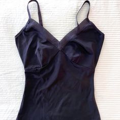 Spanx Shapewear Cami; Designed With Shaping Compression, This Cami Is Your Go-To Solution As An Everyday Layering Camisole. New, Never Worn. Black, Women's Small. Breathable & Quick-Dry. Super-Soft, Brushed Single-Layer Microfiber. Womens Shapewear, Adjustable Bra, Bra Strap, Women's Shapewear, Bra Straps, Shapewear, Women's Intimates, Quick Dry, New Color