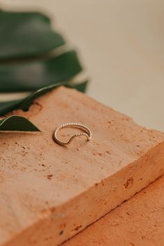 Originally designed to be paired with one of our Gemstone Rings, our Dune Ring stacks beautifully with any Stacking Bands and can hold it's own as a solo ring, too. Twisted wire is hand-shaped and made into a unique stacking ring. Available in 14kt Gold Fill + Sterling Silver. Handmade in Eau Claire, WI. Our jewelry is handmade so each piece will be unique and may vary slightly from what is pictured. Nickel-free Open Stackable Rings For Promise, Nickel-free Stackable Open Rings For Promise, Modern Twist Stackable Open Band Jewelry, Modern Twist Open Band Metal Ring, Adjustable Open Band Promise Ring, Adjustable Stackable Jewelry Ring, Adjustable Stackable Open Ring Jewelry, Adjustable Hoop Rings For Everyday, Modern Stackable Jewelry As Gift