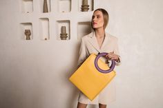 This lightweight yellow handbag is the perfect bag for work and the best choice for summer handbag. Spacious handbag Buttercup – harmony and ingenious minimalism. ▪️ Inside the bag – dirt resistant lining and one zippered leather pocket for phone/keys; ▪️ Handbag safely closes with zipper; ▪️ It has one detachable strap, which is 1 meter long; ▪️ Measurements: 35 x 30 x 15 cm. Yellow Top Handle Satchel For Office, Yellow Office Bag With Top Carry Handle, Modern Yellow Bags With Top Carry Handle, Modern Yellow Bag With Top Carry Handle, Modern Yellow Shoulder Bag For On-the-go, Yellow Handheld Bag For Shopping, Shoulder Bag With Round Handle For Daily Use, Yellow Handheld Shopping Bag, Yellow Office Bags With Double Handle