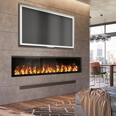 a living room with a large television mounted on the wall and a fire in the fireplace