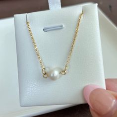 Enhance your feminine grace with our Single Pearl Necklace. Made with a dainty, cute design, this necklace will add a touch of girly elegance to any outfit. Stand out and make a statement with this unique and sophisticated accessory. 15 inches long + 2 inches ext 18K PVD gold plated stainless steel Fresh Water Pearl Pendant Non Tarnish And Water Resistant Single Pearl Necklace, Single Pearl, Jewelry Care Instructions, Faux Mink Lashes, Fresh Water Pearl, Stone Collection, For Sale Sign, Cute Design, Pearl Pendant