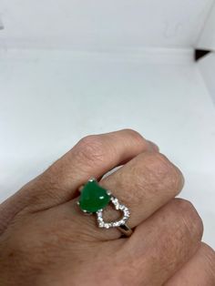 Vintage green nephrite jade Ornate German Silver ring, does not tarnish, NOT sterling Sizes 7, 8 or 9 All rings are shipped in a nice gift box. Check out our over a THOUSAND great reviews Engraving is $4 per letter and is not always perfect depending on the piece. It can take a few days if the jeweler is busy. This is payable to Paypal Judithsltd@gmail.com Fine Jewelry Green Heart Ring For May Birthstone, Green Heart Ring For May Birthstone, Fine Jewelry Style, Green Heart Ring For May Birthstone, Fine Jewelry Green Heart Shaped Ring, Green Heart-shaped Fine Jewelry Ring, Heart-shaped Green Emerald Ring For May Birthstone, Green Gemstone Heart Cut Rings, Green Gemstone Rings With Heart Cut, Green Heart-shaped Ring For May Birthstone